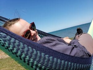 Jennifer Doré Dallas in hammock in the Magdalen Islands