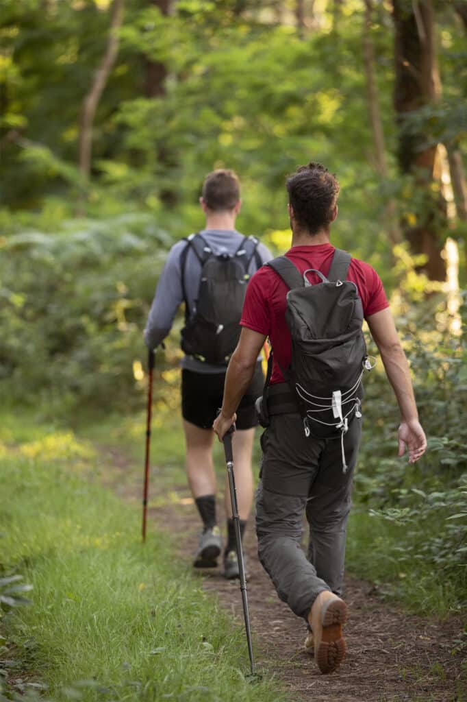Men in Forest - with Hiking Poles - Freepik