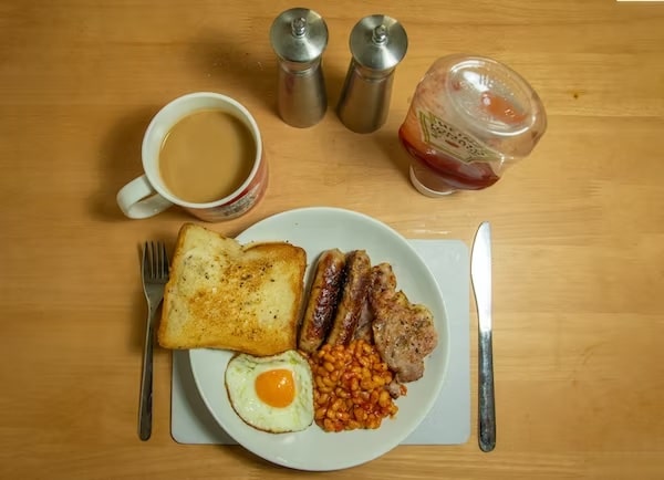 Traditional Breakfast - With Toast Egg Sausage Bean and Coffee