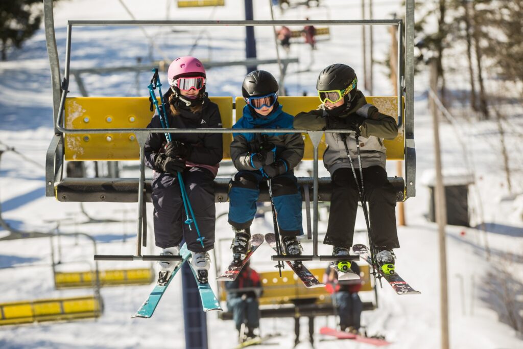 Kids on a Chairlift - for a Ski Lesson - in Ski Resort - Bromont Montagne Dexperiences