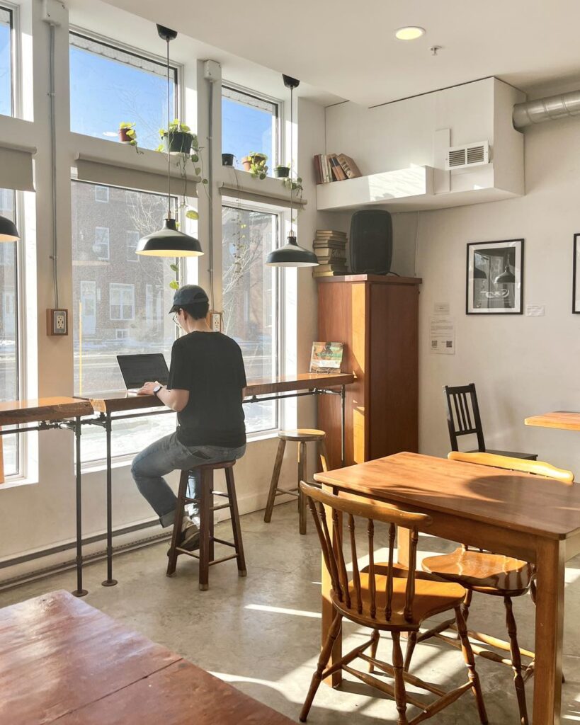 A Person Working in a Café - in Quebec City - Saint-Suave Librairie Café