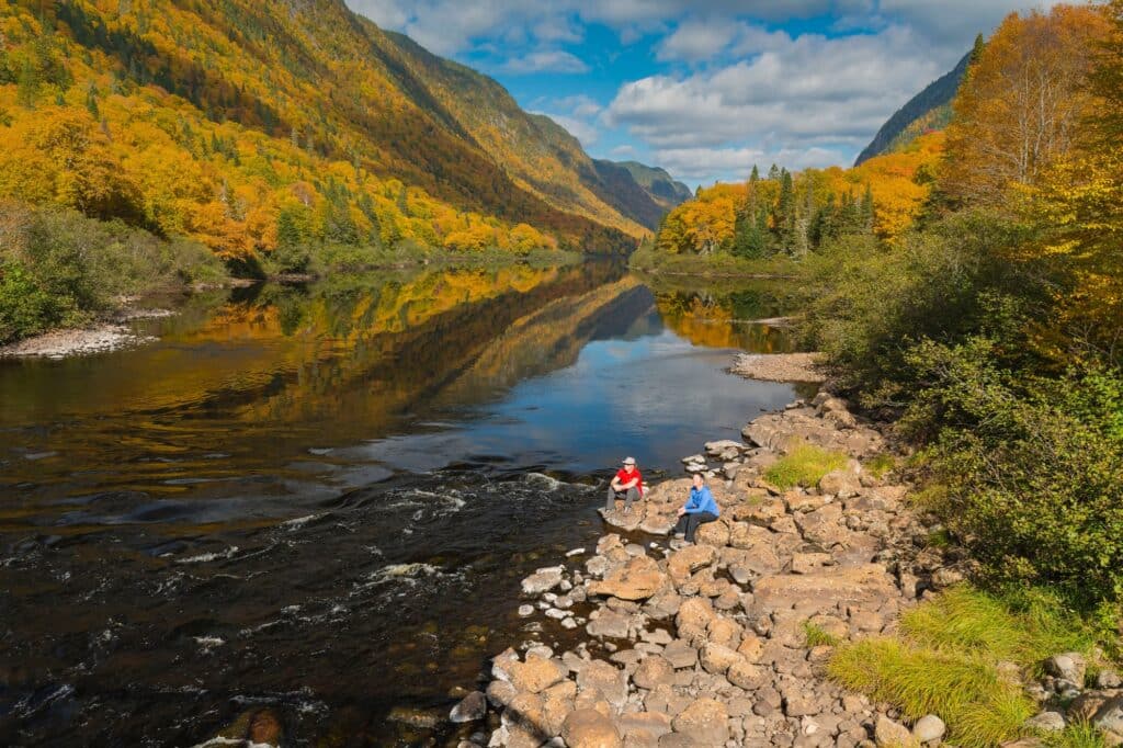 People Relaxing near the River - in Autumn - Jacques-Cartier National Park - Steve Deschenes - SEPAQ