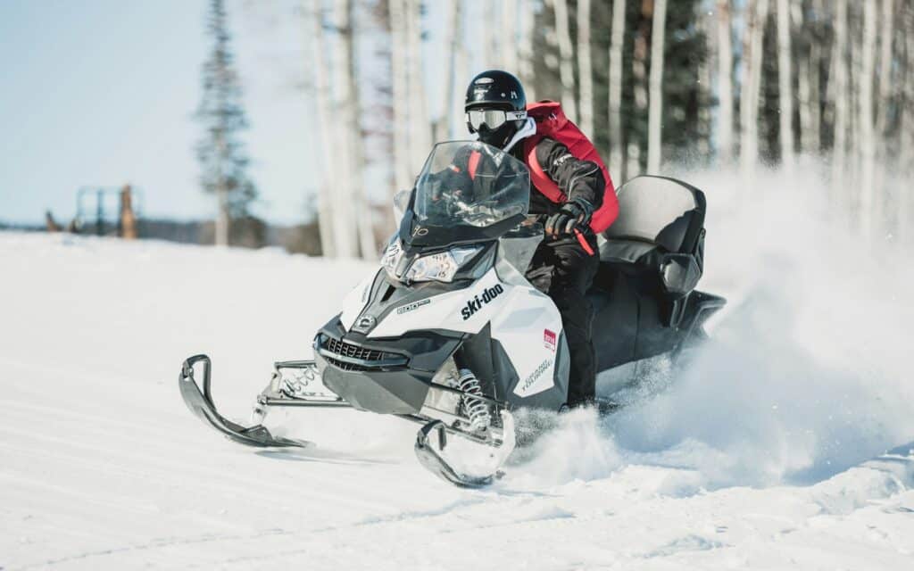 Person Riding Snow Mobile - During Daytime - Spencer Davis - from Unsplash