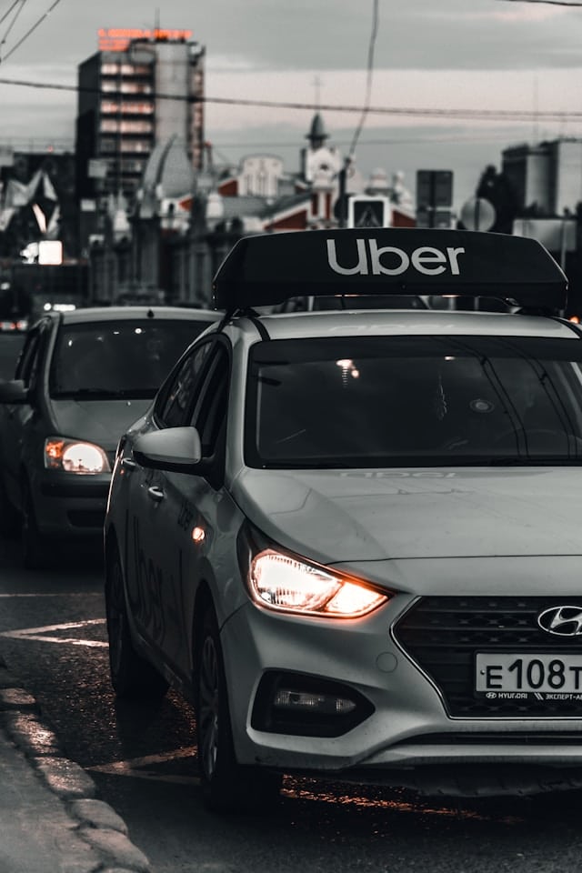 Car with Uber Service - on the Street at Night - Viktor Avdeev - From Unsplash