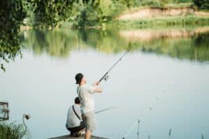 Two Friends Fishing - on a Calm River - Vitalii Khodzinskyi - From Unsplash