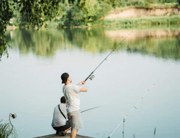 Two Friends Fishing - on a Calm River - Vitalii Khodzinskyi - From Unsplash
