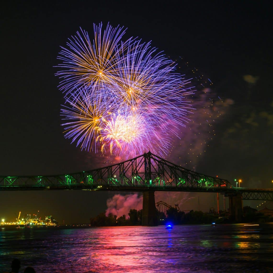 La Ronde Fireworks in Montreal - near the Jacques-Cartier Bridge - Zhanhong Cheng - From Unsplash